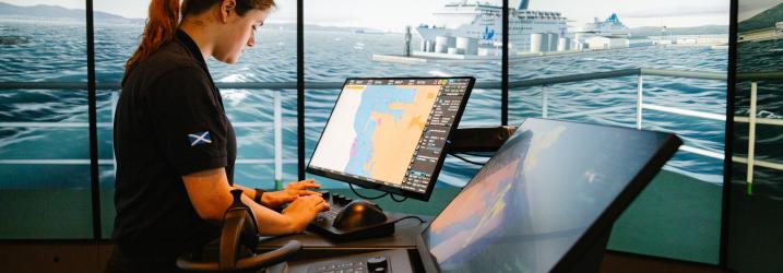 A student working in the new shipping simulation hub